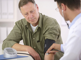 a man taking his blood pressure