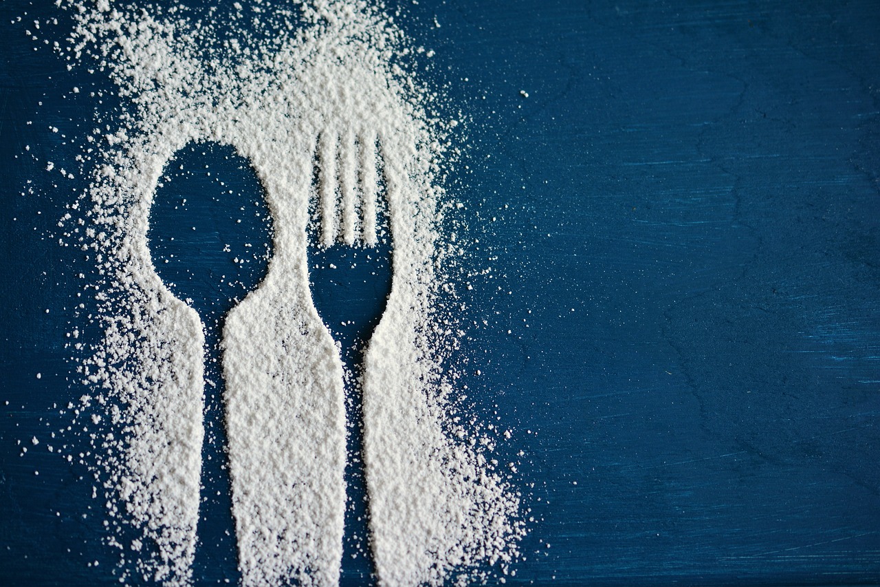 Banish Excessive Salt and Sugar from Your Diet for Optimal Health In this article, Dr. Chauncey Crandall explains why we need to reduce our salt and sugar consumption and provides practical tips to help us do it. Salt is an essential nutrient, but we consume far too much. The American Heart Association recommends an ideal daily intake of three-quarters of a teaspoon, but many Americans consume five to ten times that amount! One way to cut back is to avoid processed foods, typically high in salt. Try giving yourself a 30-day break from added salt and experiment with herbs like basil, garlic, oregano, sage, thyme, turmeric, and cinnamon to add flavor. Sugar is another culprit that sneaks into our diets under different names, such as fructose, glucose, lactose, maltodextrin, and dextrose. Even foods marketed as "healthy" can contain high added sugars, like flavored yogurt. Learning to read labels and substituting fresh fruit can reduce your intake. Alcoholic drinks and fruit juices can also contribute to high sugar consumption. Dr. Crandall recommends drinking sparkling water with a squeeze of lime or a few raspberries instead of cocktails and avoiding fruit juice altogether. Finally, when you crave something sweet, reach for dark chocolate or add a drizzle of dark chocolate syrup to fresh berries. With these simple swaps and strategies, you can banish excessive salt and sugar from your diet and promote optimal health.